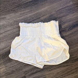 FP Movement by Free People Cream Ruffle Waist Shorts